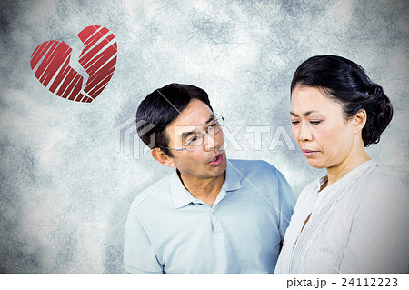 Composite image of older asian couple having an argument 24112223