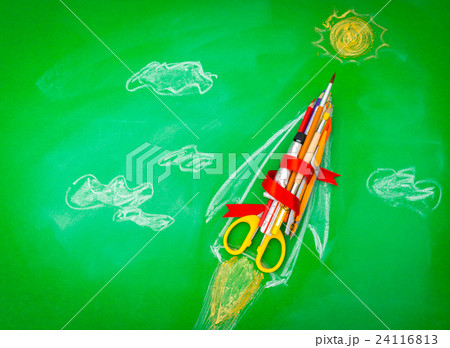 Rocket made from School supplies on Green chalkboard " Back to school background " . Rocket made from School supplies on Green chalkboard " Back to school background " . 24116813
