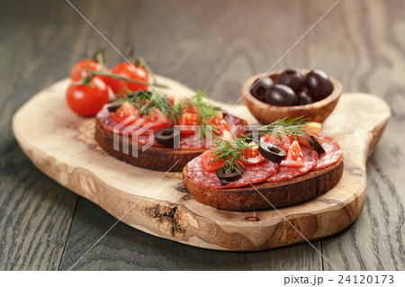 open rye sandwich with salami and vegetables 24120173