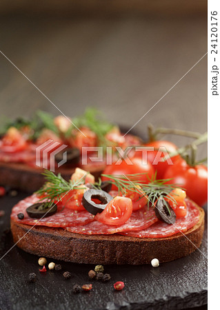 open rye sandwich with salami and vegetables 24120176