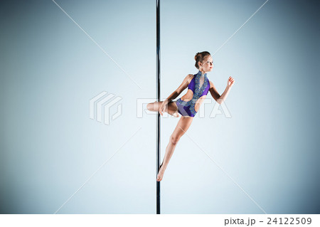 The strong and graceful young girl performing The strong and graceful young girl performing 24122509