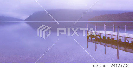 Tranquil Peaceful Lake with Jetty 24125730