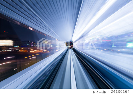 Light trail accelerating through a tunnel 24130164