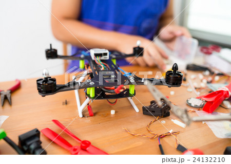 Man install the flying drone Man install the flying drone 24132210