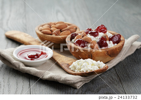 cottage cheese with preserved strawberry in wood cottage cheese with preserved strawberry in wood 24133732
