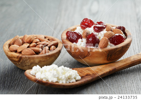 cottage cheese with preserved strawberry in wood cottage cheese with preserved strawberry in wood 24133735