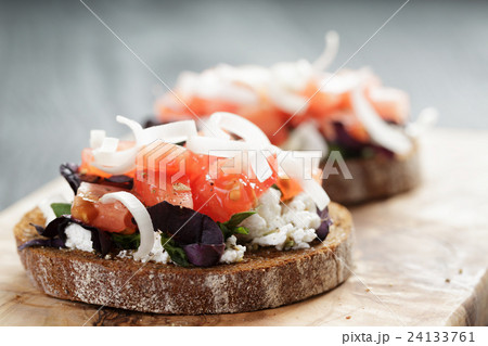 rye sandwich or bruschetta with ricotta, herbs 24133761