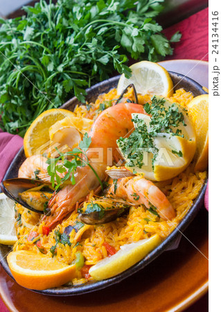 paella with shrimps and vegetables paella with shrimps and vegetables 24134416
