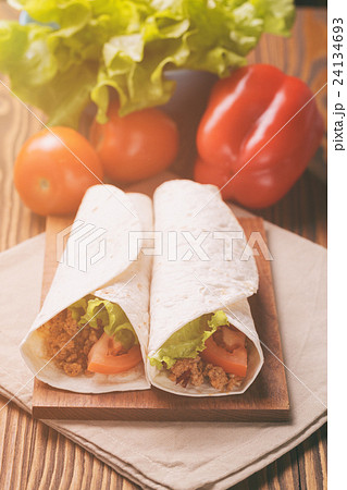 Fresh tortilla wraps with meat and vegetables 24134693