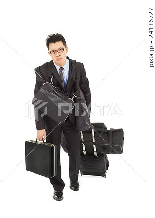 exhausted businessman taking all bags exhausted businessman taking all bags 24136727