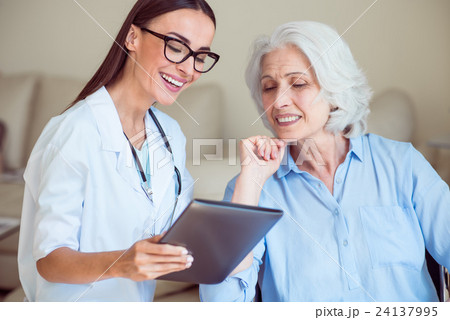 Nice doctor with senior patient 24137995