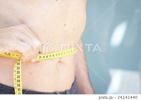 Measuring waist with tape 24142440