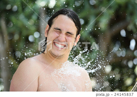 man in water splashes 24145837