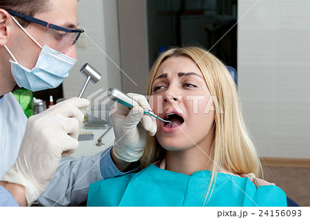 Woman seeing a dentist Woman seeing a dentist 24156093