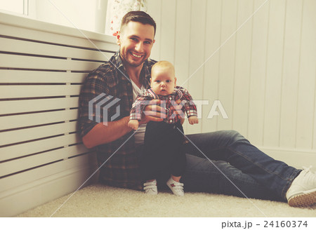 Happy family father and child baby son playing at home 24160374