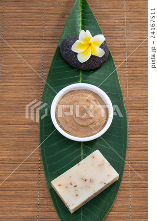 above veiw, soap flower Facial mask on green leaf above veiw, soap flower Facial mask on green leaf 24167511