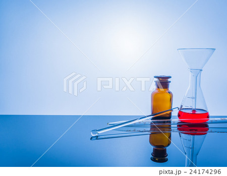 glassware with blur laboratory in background. 24174296