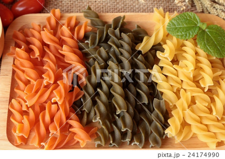 Raw homemade italian pasta colorful for cooking. Raw homemade italian pasta colorful for cooking. 24174990