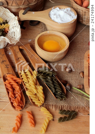 Raw homemade italian pasta colorful for cooking. 24174994