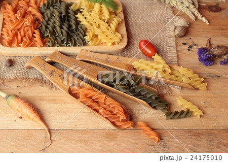 Raw homemade italian pasta colorful for cooking. 24175010