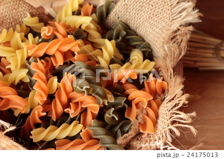 Raw homemade italian pasta colorful for cooking. Raw homemade italian pasta colorful for cooking. 24175013