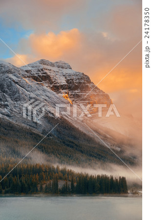 Foggy mountain sunset 24178350