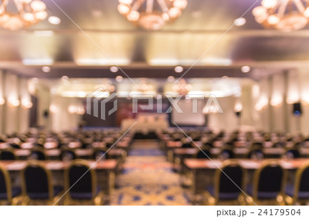 Abstract blurred photo of conference hall or seminar room with attendee background Abstract blurred photo of conference hall or seminar room with attendee background 24179504
