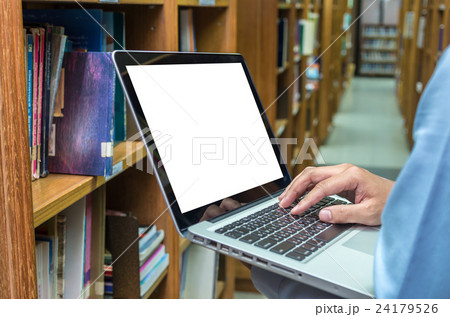 Businessman using the laptop conputer in the library, education and business concept Businessman using the laptop conputer in the library, education and business concept 24179526