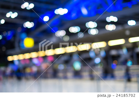 Blurry Passengers checking counter in airport Blurry Passengers checking counter in airport 24185702