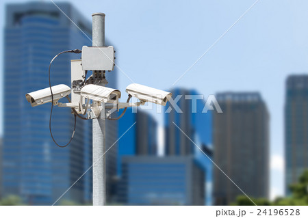 CCTV pillar with building in the city background 24196528