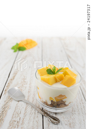 Homemade Mango Yoghurt Parfait with Granola Homemade Mango Yoghurt Parfait with Granola 24197317