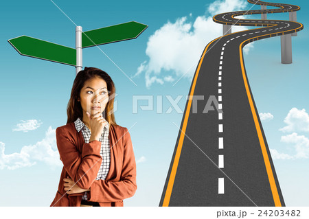 Composite image of serious businesswoman holding her chin Composite image of serious businesswoman holding her chin 24203482
