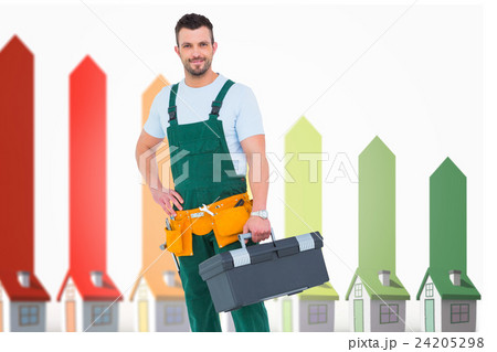 Composite image of smiling carpenter with toolbox 24205298