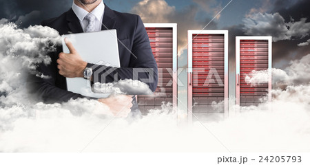 Composite image of mid section of businessman holding computer Composite image of mid section of businessman holding computer 24205793