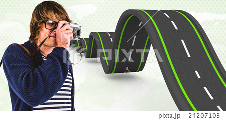 Composite image of hipster taking pictures with an old camera Composite image of hipster taking pictures with an old camera 24207103