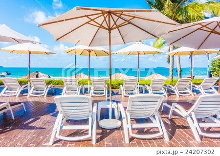 Umbrella and chair 24207302