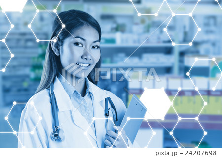 Composite image of asian doctor holding clipboard Composite image of asian doctor holding clipboard 24207698
