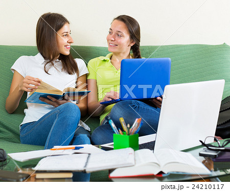 Student girls studying at home 24210117