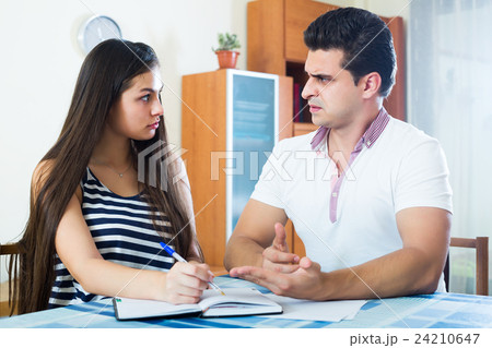 Family making list of purchases Family making list of purchases 24210647