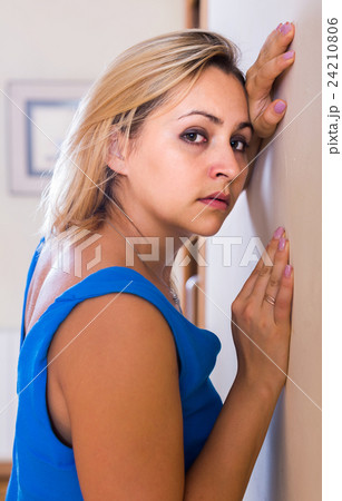 adult girl grieving for something at home adult girl grieving for something at home 24210806