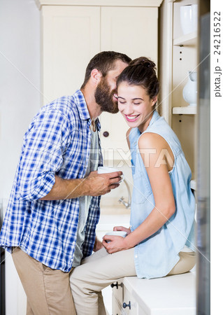 Young couple having fun in kitchen 24216522