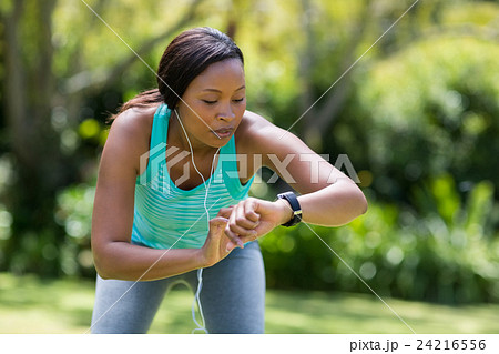 Woman looking her watch 24216556