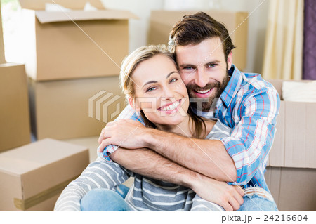Portrait of couple embracing each other 24216604