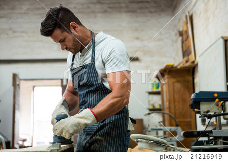 Carpenter working on his craft  24216949