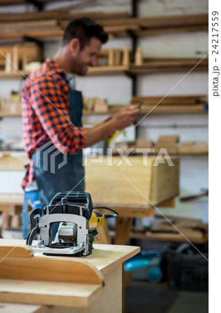 Carpenter working on his craft 24217559
