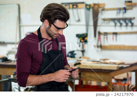 Carpenter on the phone Carpenter on the phone 24217970