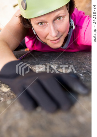Woman rock climbing  24218734