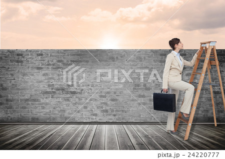 Composite image of businesswoman climbing career ladder with briefcase 24220777