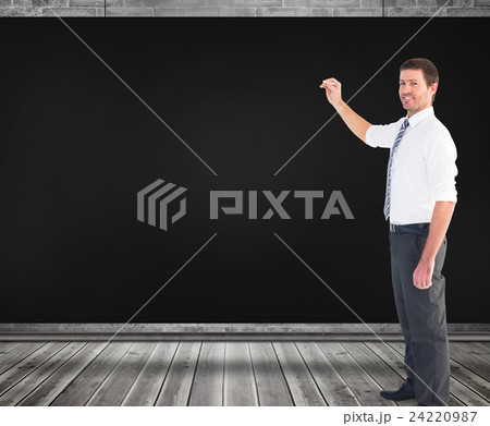 Composite image of businessman standing with his briefcase Composite image of businessman standing with his briefcase 24220987