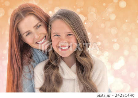 Composite image of portrait of happy mother with daughter 24221440